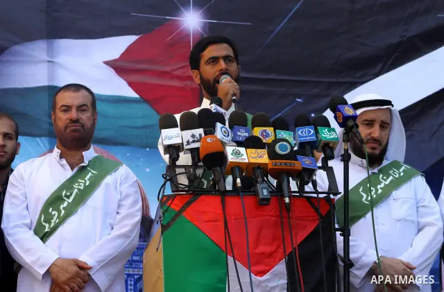 Palestinian Hamas leaders take part in a rally in Jabalya, northern Gaza Strip October 7, 2011, to show solidarity with Palestinian prisoners held in Israeli jails. Hundreds of Palestinians in Israeli jails have joined a...
