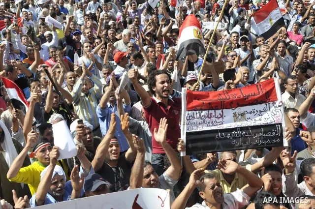 Egyptian demonstrators take part in a weekly protest in Tahrir Square, Cairo, Egypt, Friday, Oct. 7, 2011. Thousands of Egyptians protested Friday against the country's military rulers decision to retain the much hated e...