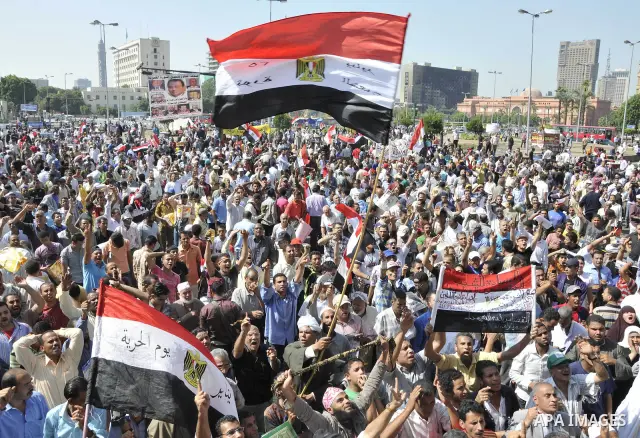 Egyptian demonstrators take part in a weekly protest in Tahrir Square, Cairo, Egypt, Friday, Oct. 7, 2011. Thousands of Egyptians protested Friday against the country's military rulers decision to retain the much hated e...
