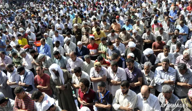 Egyptian demonstrators attend Friday prayers during a weekly protest in Tahrir Square, Cairo, Egypt, Friday, Oct. 7, 2011. Thousands of Egyptians protested Friday against the country's military rulers decision to retain...