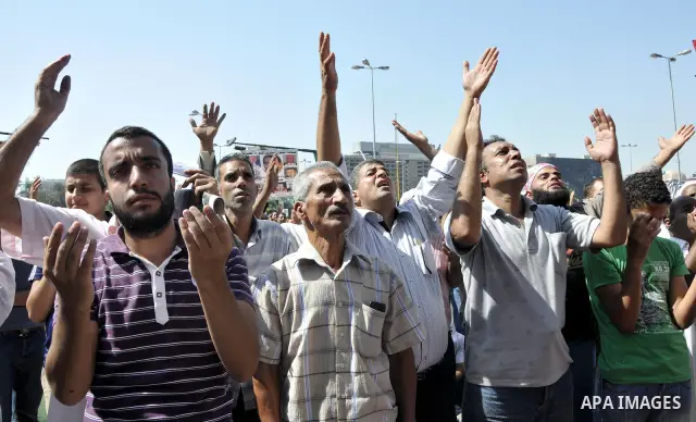 Egyptian demonstrators take part in a weekly protest in Tahrir Square, Cairo, Egypt, Friday, Oct. 7, 2011. Thousands of Egyptians protested Friday against the country's military rulers decision to retain the much hated e...