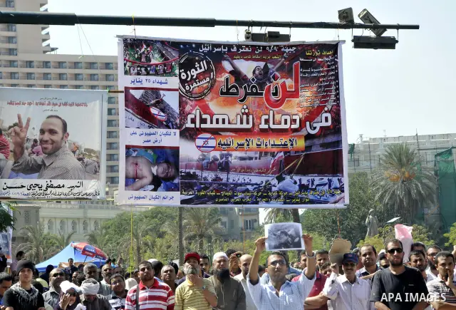 Egyptian demonstrators take part in a weekly protest in Tahrir Square, Cairo, Egypt, Friday, Oct. 7, 2011. Thousands of Egyptians protested Friday against the country's military rulers decision to retain the much hated e...