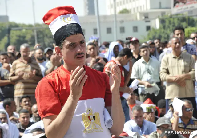 Egyptian demonstrators take part in a weekly protest in Tahrir Square, Cairo, Egypt, Friday, Oct. 7, 2011. Thousands of Egyptians protested Friday against the country's military rulers decision to retain the much hated e...
