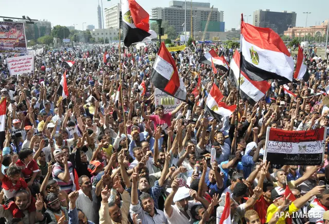 Egyptian demonstrators take part in a weekly protest in Tahrir Square, Cairo, Egypt, Friday, Oct. 7, 2011. Thousands of Egyptians protested Friday against the country's military rulers decision to retain the much hated e...