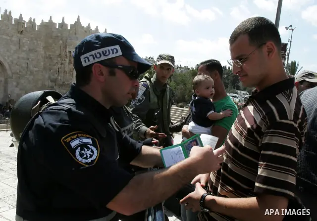 Israeli police stand guard in front of Damascus Gate in Jerusalem's Old City on October 7,2011. Israel limited access to Jerusalem's Al-Aqsa mosque compound for fear of violence on the Muslim weekly day of prayer, which...