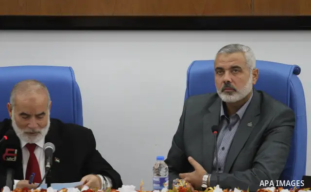 Palestinian Prime Minister in Gaza Strip, Ismail Haniya, attend a session of the Palestinian parliament to discuss the issue of the Palestinian prisoners jailed in Israel, in Gaza City on Oct. 09, 2011. Photo by Mohammed...
