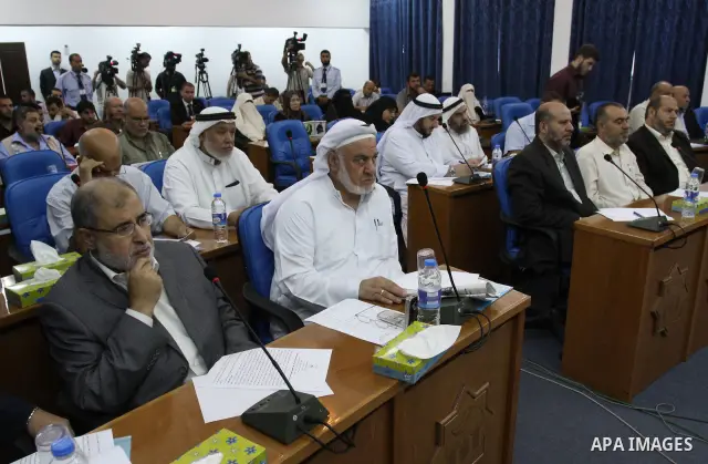 Members of Hamas Parliament attend a session of the Palestinian parliament parliament to discuss the issue of the Palestinian prisoners jailed in Israel, in Gaza City on Oct. 09, 2011. Photo by Mohammed Asad