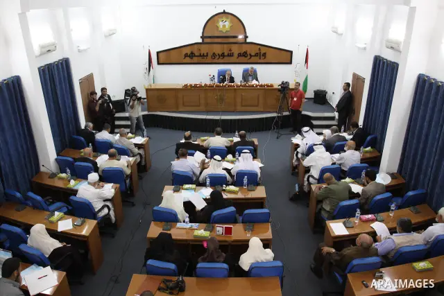 Members of Hamas Parliament attend a session of the Palestinian parliament parliament to discuss the issue of the Palestinian prisoners jailed in Israel, in Gaza City on Oct. 09, 2011. Photo by Mohammed Asad