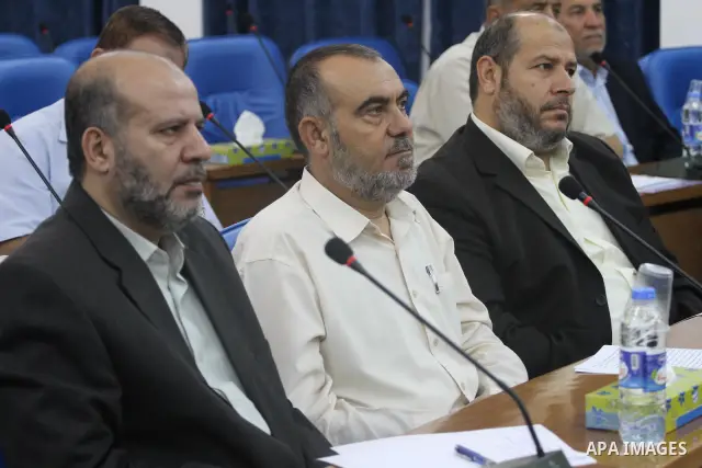 Members of Hamas Parliament attend a session of the Palestinian parliament parliament to discuss the issue of the Palestinian prisoners jailed in Israel, in Gaza City on Oct. 09, 2011. Photo by Mohammed Asad