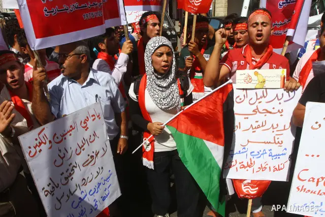 Palestinians shout during a demonstration calling for the release of prisoners from Israeli jails and in support of inmates on a hunger strike, on Oct,09, 2011, in Gaza City. Hundreds of Palestinians in Israeli jails hav...