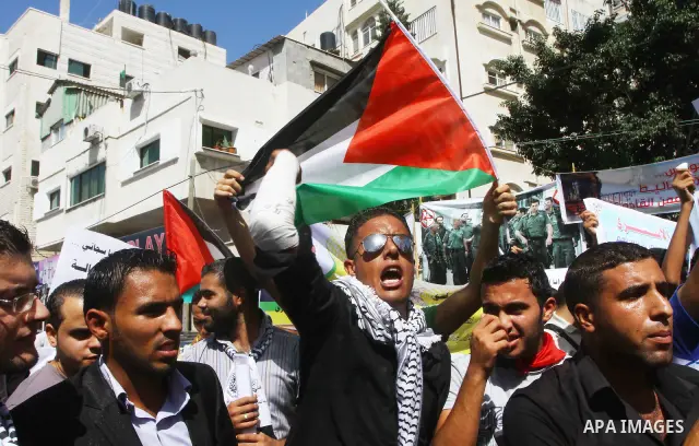 Palestinians shout during a demonstration calling for the release of prisoners from Israeli jails and in support of inmates on a hunger strike, on Oct,09, 2011, in Gaza City. Hundreds of Palestinians in Israeli jails hav...