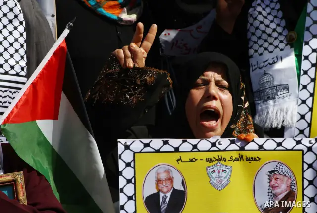 Palestinians shout during a demonstration calling for the release of prisoners from Israeli jails and in support of inmates on a hunger strike, on Oct,09, 2011, in Gaza City. Hundreds of Palestinians in Israeli jails hav...