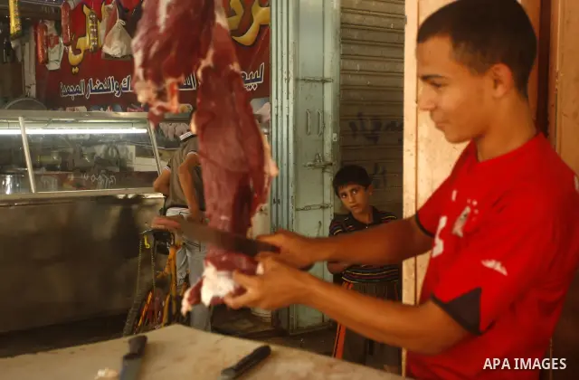 Palestinians shop at the old Fras market in Gaza city on Oct. 9,2011. A Palestinian investor rented Fras from the government in Gaza Strip to establish a large mall instead of the old market which oppose with refuse and...