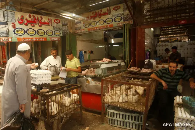 Palestinians shop at the old Fras market in Gaza city on Oct. 9,2011. A Palestinian investor rented Fras from the government in Gaza Strip to establish a large mall instead of the old market which oppose with refuse and...