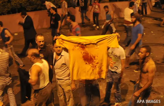 Coptic Egyptian demonstrators gather by during cashes with Egyptian Army soldiers following a demonstration in Cairo, Egypt Sunday, Oct. 9, 2011. Egyptian state television reports at least one soldier has been killed in...