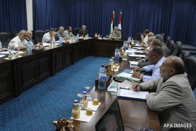 Palestinian Prime Minister in Gaza Ismail Haniyeh during his meeting with the Palestinian Government in Gaza to discuss the issue of the Palestinian prisoners jailed in Israel, in Gaza City on Oct. 11, 2011. . Photo by M...