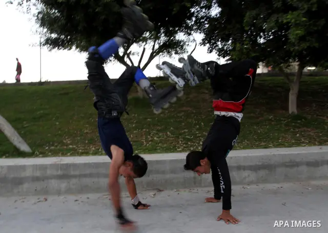 Palestinian wheel athletes demonstrate their skills at a park in Gaza city on Oct. 11,2011. Tens of Palestinian youths find parkour good game to waste their free time. Photo by Mohammed Asad