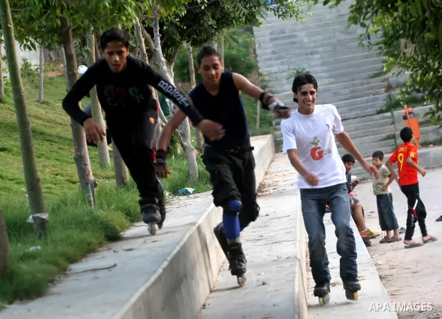 Palestinian wheel athletes demonstrate their skills at a park in Gaza city on Oct. 11,2011. Tens of Palestinian youths find parkour good game to waste their free time. Photo by Mohammed Asad