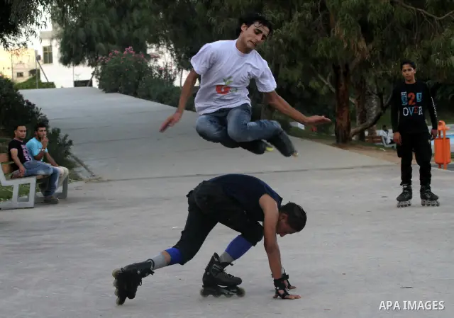 Palestinian wheel athletes demonstrate their skills at a park in Gaza city on Oct. 11,2011. Tens of Palestinian youths find parkour good game to waste their free time. Photo by Mohammed Asad