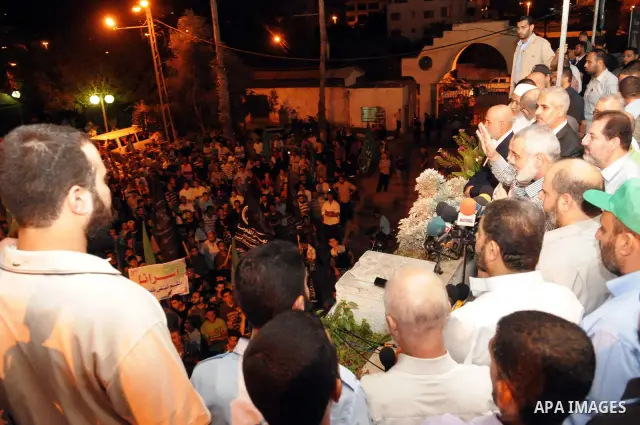 Palestinian prime minister in Gaza Strip, Ismail Haniya takes part in a rally celebrating news of a prisoner swap between Hamas and Israel, in Gaza City October 11, 2011. Israel and Gaza's Hamas Islamist rulers agreed on...