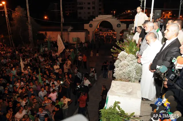 Palestinian prime minister in Gaza Strip, Ismail Haniya takes part in a rally celebrating news of a prisoner swap between Hamas and Israel, in Gaza City October 11, 2011. Israel and Gaza's Hamas Islamist rulers agreed on...