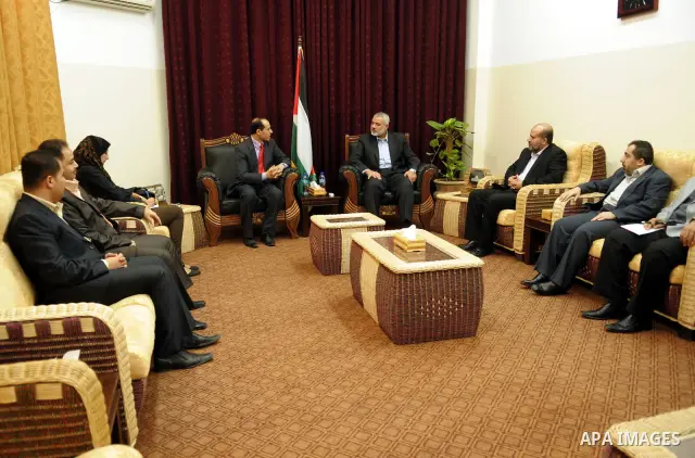 Palestinian prime minister in Gaza Strip, Ismail Haniya meets with the Egyptian media delegation at his office in Gaza city on Oct. 12,2011. Photo by Ahmed Shaat
