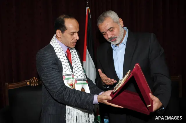 Palestinian prime minister in Gaza Strip, Ismail Haniya meets with the Egyptian media delegation at his office in Gaza city on Oct. 12,2011. Photo by Ahmed Shaat