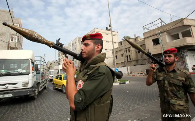 Members of Hamas national security forces Ca street as they celebrate a prisoner swap between Hamas and Israel, in Gaza City October 12, 2011. Prospects of a long-elusive deal with Hamas to secure the release of Israeli...