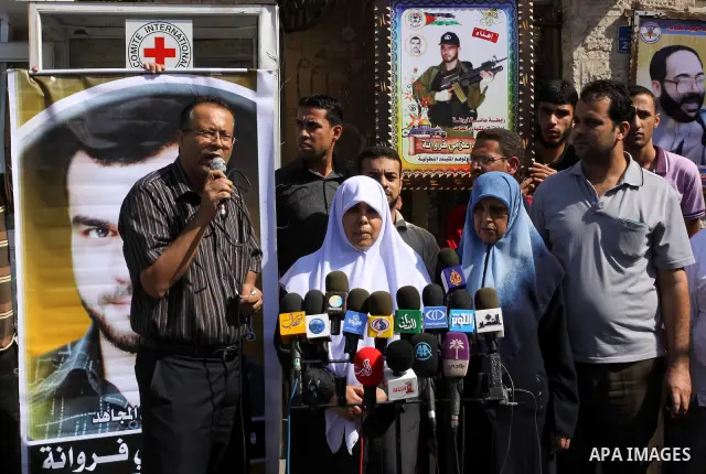 Family of the Palestinian Martyr, Mohammed Azmi Ferwana deliver speech during a press conference demanding the release of their son's body that being held by Israeli occupation in Gaza city on Oct. 13, 2011 . where he pa...