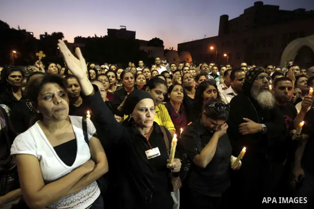 Nearly 3,000 Egyptian mourners gather in central Cairo on October 13, 2011 in honour of Coptic Christians among 25 people killed in weekend clashes during a demonstration over an attack on a church. Egypt's government sa...