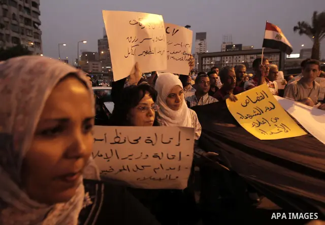 Nearly 3,000 Egyptian mourners gather in central Cairo on October 13, 2011 in honour of Coptic Christians among 25 people killed in weekend clashes during a demonstration over an attack on a church. Egypt's government sa...
