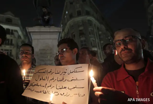 Nearly 3,000 Egyptian mourners gather in central Cairo on October 13, 2011 in honour of Coptic Christians among 25 people killed in weekend clashes during a demonstration over an attack on a church. Egypt's government sa...
