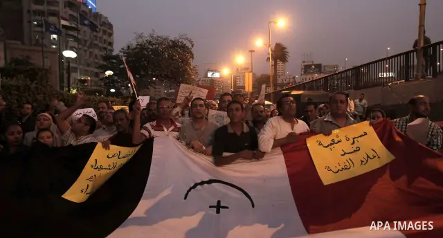 Nearly 3,000 Egyptian mourners gather in central Cairo on October 13, 2011 in honour of Coptic Christians among 25 people killed in weekend clashes during a demonstration over an attack on a church. Egypt's government sa...