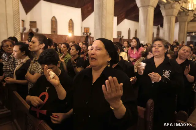 Nearly 3,000 Egyptian mourners gather in central Cairo on October 13, 2011 in honour of Coptic Christians among 25 people killed in weekend clashes during a demonstration over an attack on a church. Egypt's government sa...