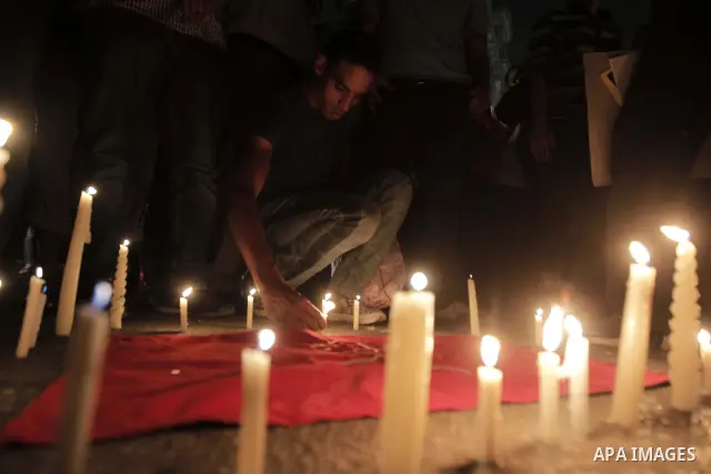 Nearly 3,000 Egyptian mourners gather in central Cairo on October 13, 2011 in honour of Coptic Christians among 25 people killed in weekend clashes during a demonstration over an attack on a church. Egypt's government sa...