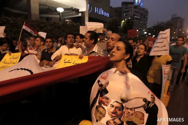 Nearly 3,000 Egyptian mourners gather in central Cairo on October 13, 2011 in honour of Coptic Christians among 25 people killed in weekend clashes during a demonstration over an attack on a church. Egypt's government sa...