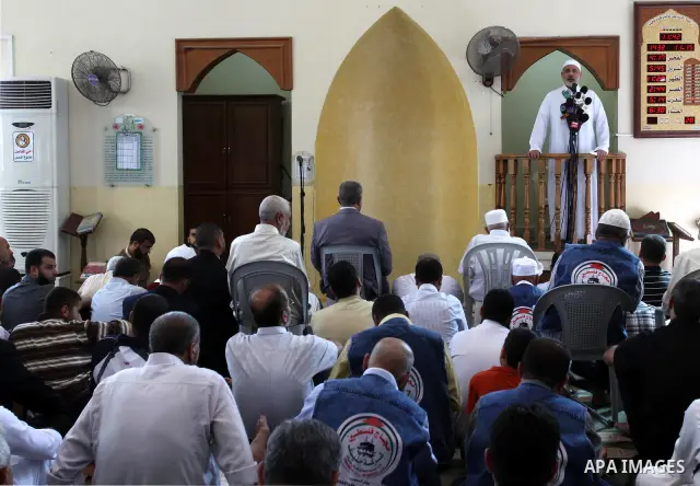 Palestinian prime minister in Gaza Strip, Ismail Haniyeh attends Friday prayers in Gaza City October 14, 2011. Israeli soldier Gilad Shalit will be freed from five years of captivity in the Gaza Strip some time next week...