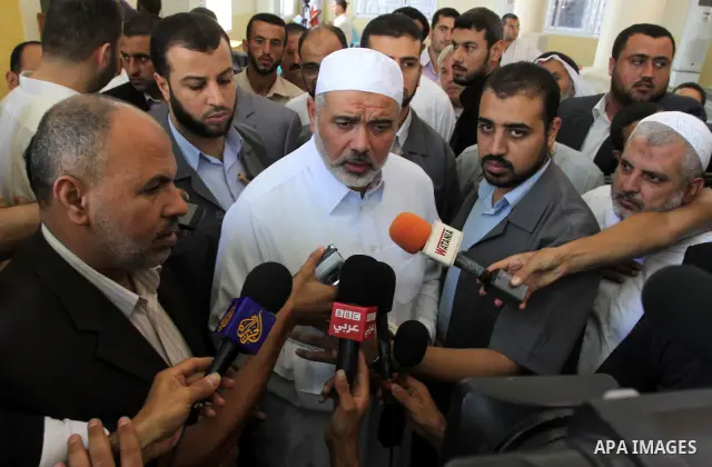 Palestinian prime minister in Gaza Strip, Ismail Haniyeh attends Friday prayers in Gaza City October 14, 2011. Israeli soldier Gilad Shalit will be freed from five years of captivity in the Gaza Strip some time next week...