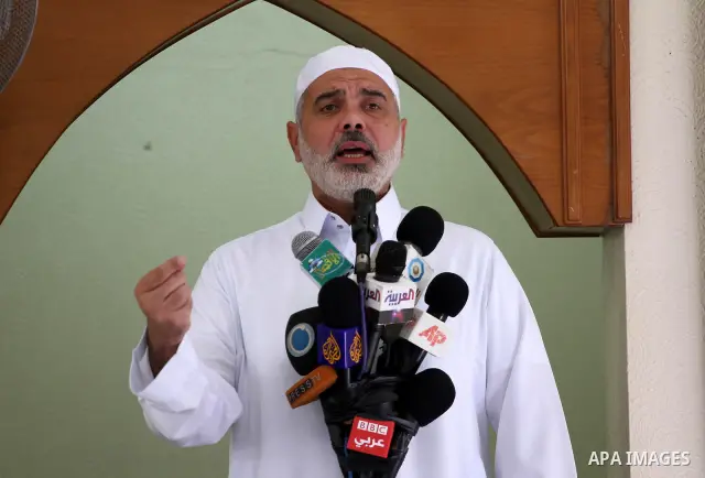 Palestinian prime minister in Gaza Strip, Ismail Haniyeh attends Friday prayers in Gaza City October 14, 2011. Israeli soldier Gilad Shalit will be freed from five years of captivity in the Gaza Strip some time next week...