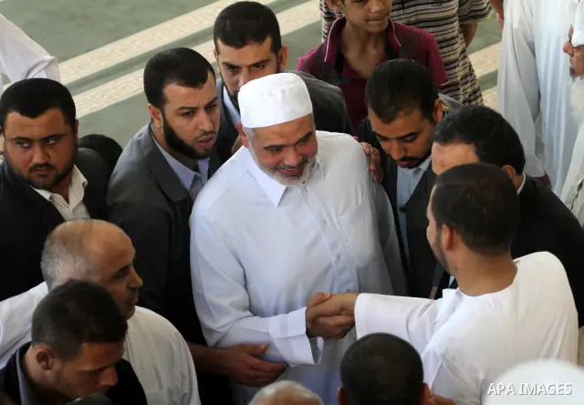 Palestinian prime minister in Gaza Strip, Ismail Haniyeh attends Friday prayers in Gaza City October 14, 2011. Israeli soldier Gilad Shalit will be freed from five years of captivity in the Gaza Strip some time next week...