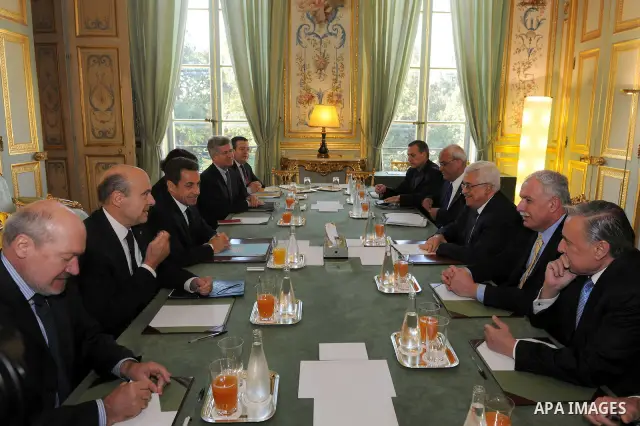 Palestinian President Mahmoud Abbas meets with French President Nicolas Sarkozy at the Elysee Palace in Paris on Oct 14,2011. Photo by Thaer Ganaim