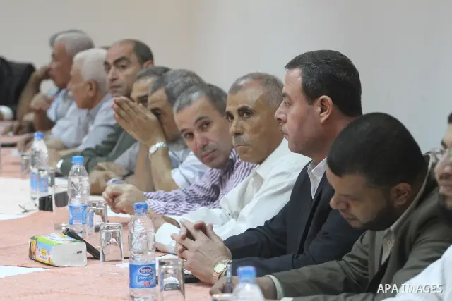 Palestinian factions leaders attend a meeting with the participation of all human rights organizations to discuss how to receive prisoners held in Israeli jails in Gaza City, oct, 15. 2011. Photo by Mohammed Asad