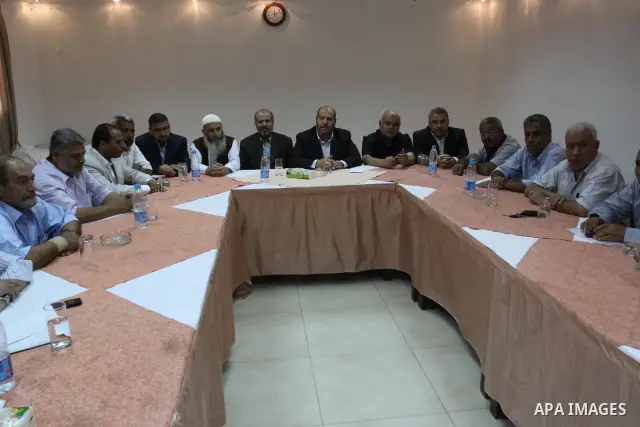 Palestinian factions leaders attend a meeting with the participation of all human rights organizations to discuss how to receive prisoners held in Israeli jails in Gaza City, oct, 15. 2011. Photo by Mohammed Asad