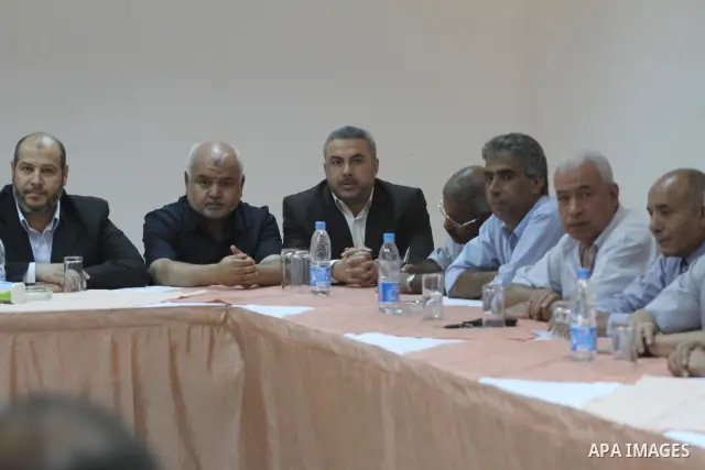 Palestinian factions leaders attend a meeting with the participation of all human rights organizations to discuss how to receive prisoners held in Israeli jails in Gaza City, oct, 15. 2011. Photo by Mohammed Asad