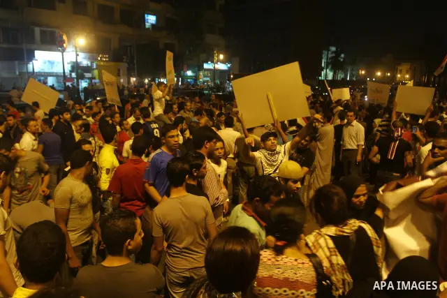 Nearly 3,000 Egyptian mourners gather in in Cairo's Tahrir Square on Oct.15, 2011, for a candlelight vigil in honor of Coptic Christians among 25 people killed in weekend clashes during a demonstration over an attack on...