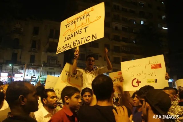 Nearly 3,000 Egyptian mourners gather in in Cairo's Tahrir Square on Oct.15, 2011, for a candlelight vigil in honor of Coptic Christians among 25 people killed in weekend clashes during a demonstration over an attack on...