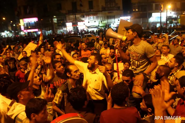 Nearly 3,000 Egyptian mourners gather in in Cairo's Tahrir Square on Oct.15, 2011, for a candlelight vigil in honor of Coptic Christians among 25 people killed in weekend clashes during a demonstration over an attack on...