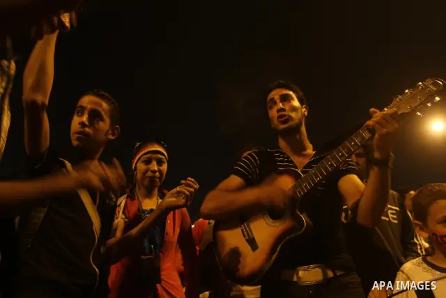 Nearly 3,000 Egyptian mourners gather in in Cairo's Tahrir Square on Oct.15, 2011, for a candlelight vigil in honor of Coptic Christians among 25 people killed in weekend clashes during a demonstration over an attack on...