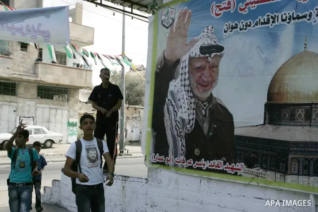 The families of Palestinian prisoners loyal to the leader of the Palestinian Fatah party led by Mahmoud Abbas, Hamas flags decorate their homes in Rafah town in the southern Gaza Strip on October 16, 2011. Israel on Sund...