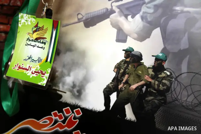 Palestinians print posters in preparation for a prisoner swap between Hamas and Israel in Gaza City, Sunday, Oct. 16, 2011. Relatives of Israelis killed in Palestinian attacks waged a charged debate Sunday over the plann...